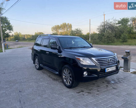 Черный Лексус ЛХ, объемом двигателя 5.66 л и пробегом 338 тыс. км за 32000 $, фото 1 на Automoto.ua