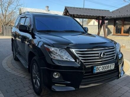 Черный Лексус ЛХ, объемом двигателя 5.66 л и пробегом 300 тыс. км за 35500 $, фото 1 на Automoto.ua
