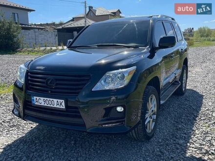 Черный Лексус ЛХ, объемом двигателя 5.66 л и пробегом 178 тыс. км за 28000 $, фото 1 на Automoto.ua