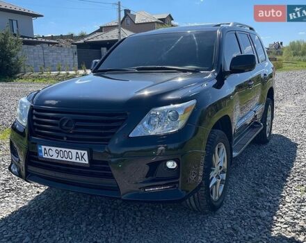 Черный Лексус ЛХ, объемом двигателя 5.66 л и пробегом 178 тыс. км за 28000 $, фото 1 на Automoto.ua