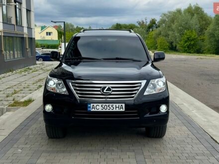 Черный Лексус ЛХ, объемом двигателя 5.7 л и пробегом 250 тыс. км за 29400 $, фото 1 на Automoto.ua