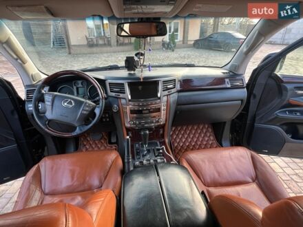Черный Лексус ЛХ, объемом двигателя 5.7 л и пробегом 205 тыс. км за 28500 $, фото 1 на Automoto.ua
