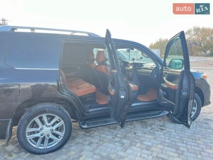 Чорний Лексус ЛХ, об'ємом двигуна 5.7 л та пробігом 205 тис. км за 31000 $, фото 1 на Automoto.ua