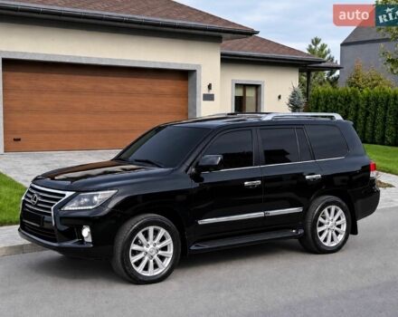 Черный Лексус ЛХ, объемом двигателя 5.7 л и пробегом 192 тыс. км за 28700 $, фото 1 на Automoto.ua