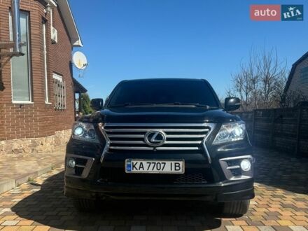 Черный Лексус ЛХ, объемом двигателя 5.66 л и пробегом 248 тыс. км за 36500 $, фото 1 на Automoto.ua