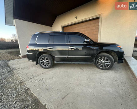Черный Лексус ЛХ, объемом двигателя 5.7 л и пробегом 160 тыс. км за 40000 $, фото 1 на Automoto.ua