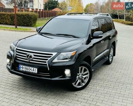Черный Лексус ЛХ, объемом двигателя 5.66 л и пробегом 176 тыс. км за 35500 $, фото 1 на Automoto.ua