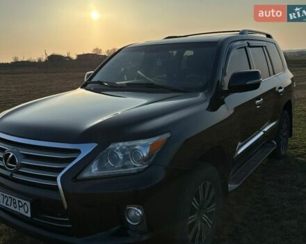 Черный Лексус ЛХ, объемом двигателя 5.7 л и пробегом 310 тыс. км за 33500 $, фото 1 на Automoto.ua