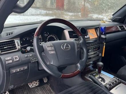Черный Лексус ЛХ, объемом двигателя 5.66 л и пробегом 54 тыс. км за 50000 $, фото 1 на Automoto.ua