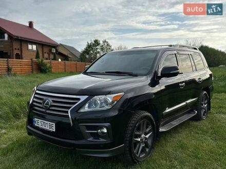 Черный Лексус ЛХ, объемом двигателя 5.7 л и пробегом 185 тыс. км за 39500 $, фото 1 на Automoto.ua