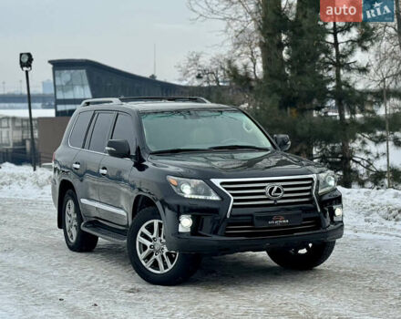 Черный Лексус ЛХ, объемом двигателя 5.7 л и пробегом 179 тыс. км за 33777 $, фото 1 на Automoto.ua