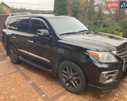 Черный Лексус ЛХ, объемом двигателя 5.66 л и пробегом 330 тыс. км за 32000 $, фото 1 на Automoto.ua