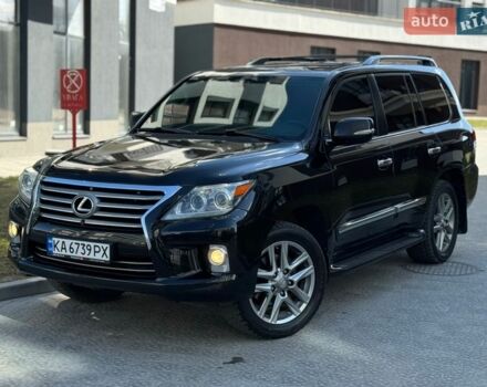 Черный Лексус ЛХ, объемом двигателя 5.66 л и пробегом 193 тыс. км за 32500 $, фото 1 на Automoto.ua