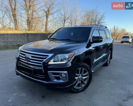 Черный Лексус ЛХ, объемом двигателя 5.66 л и пробегом 185 тыс. км за 36500 $, фото 1 на Automoto.ua