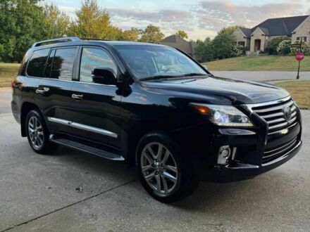 Черный Лексус ЛХ, объемом двигателя 5.7 л и пробегом 72 тыс. км за 2700 $, фото 1 на Automoto.ua