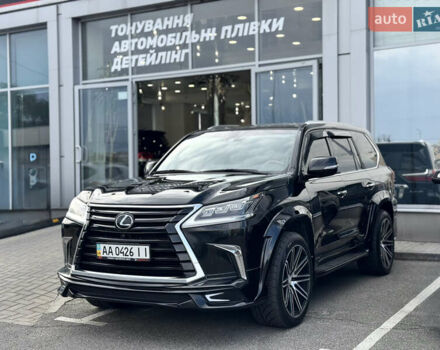Черный Лексус ЛХ, объемом двигателя 5.7 л и пробегом 195 тыс. км за 68000 $, фото 1 на Automoto.ua