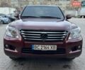 Красный Лексус ЛХ, объемом двигателя 5.66 л и пробегом 250 тыс. км за 31777 $, фото 1 на Automoto.ua