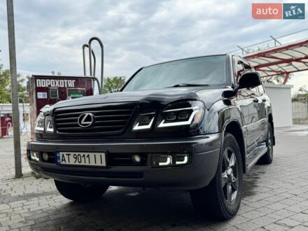 Красный Лексус ЛХ, объемом двигателя 4.67 л и пробегом 327 тыс. км за 16500 $, фото 1 на Automoto.ua