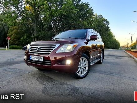 Червоний Лексус ЛХ, об'ємом двигуна 5.7 л та пробігом 245 тис. км за 26500 $, фото 1 на Automoto.ua