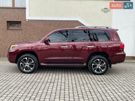 Красный Лексус ЛХ, объемом двигателя 5.66 л и пробегом 257 тыс. км за 32500 $, фото 1 на Automoto.ua