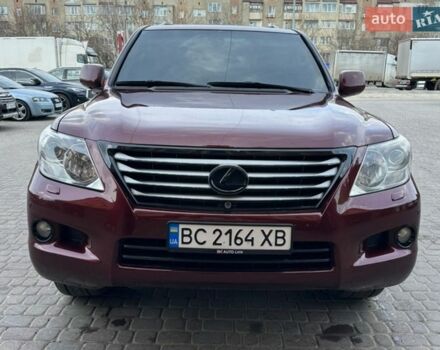 Красный Лексус ЛХ, объемом двигателя 5.66 л и пробегом 250 тыс. км за 31777 $, фото 1 на Automoto.ua