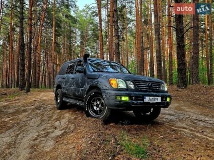 Сірий Лексус ЛХ, об'ємом двигуна 4.67 л та пробігом 375 тис. км за 23000 $, фото 1 на Automoto.ua
