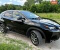 Черный Лексус НХ, объемом двигателя 2 л и пробегом 165 тыс. км за 20200 $, фото 1 на Automoto.ua