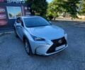Сірий Лексус НХ, об'ємом двигуна 2 л та пробігом 115 тис. км за 24496 $, фото 1 на Automoto.ua