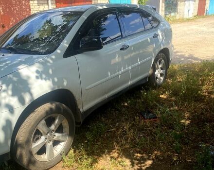 Белый Лексус РХ, объемом двигателя 3.3 л и пробегом 240 тыс. км за 8500 $, фото 1 на Automoto.ua