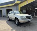 Белый Лексус РХ, объемом двигателя 3 л и пробегом 312 тыс. км за 3400 $, фото 1 на Automoto.ua
