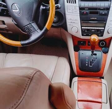 Білий Лексус РХ, об'ємом двигуна 3.31 л та пробігом 272 тис. км за 11000 $, фото 2 на Automoto.ua