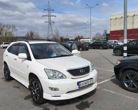 Белый Лексус РХ, объемом двигателя 3.5 л и пробегом 252 тыс. км за 12500 $, фото 2 на Automoto.ua