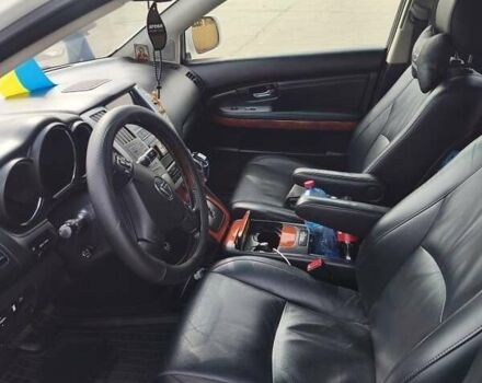 Белый Лексус РХ, объемом двигателя 3.5 л и пробегом 252 тыс. км за 12500 $, фото 1 на Automoto.ua