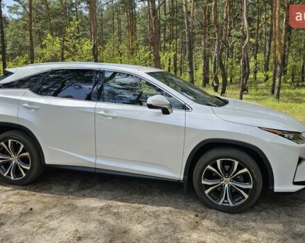 Білий Лексус РХ, об'ємом двигуна 2 л та пробігом 105 тис. км за 35400 $, фото 1 на Automoto.ua