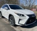 Білий Лексус РХ, об'ємом двигуна 2 л та пробігом 147 тис. км за 587 $, фото 1 на Automoto.ua
