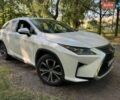 Білий Лексус РХ, об'ємом двигуна 2 л та пробігом 120 тис. км за 19999 $, фото 1 на Automoto.ua