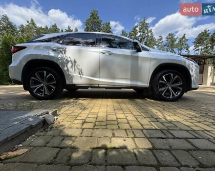 Білий Лексус РХ, об'ємом двигуна 2 л та пробігом 109 тис. км за 34500 $, фото 1 на Automoto.ua