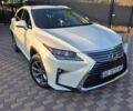 Білий Лексус РХ, об'ємом двигуна 2 л та пробігом 115 тис. км за 36700 $, фото 1 на Automoto.ua