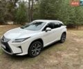 Білий Лексус РХ, об'ємом двигуна 2 л та пробігом 150 тис. км за 35500 $, фото 1 на Automoto.ua