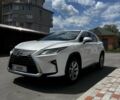 Белый Лексус РХ, объемом двигателя 3.46 л и пробегом 150 тыс. км за 32700 $, фото 1 на Automoto.ua