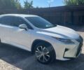 Білий Лексус РХ, об'ємом двигуна 2 л та пробігом 80 тис. км за 33000 $, фото 3 на Automoto.ua