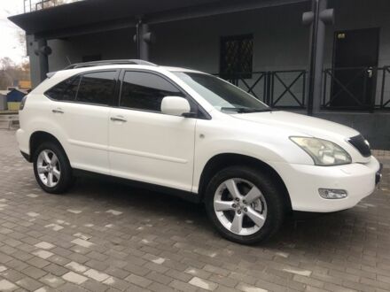 Белый Лексус РХ, объемом двигателя 3.5 л и пробегом 243 тыс. км за 10800 $, фото 1 на Automoto.ua