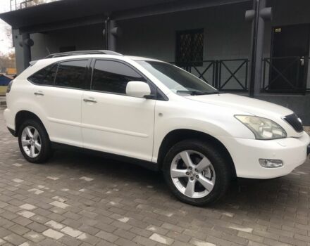 Белый Лексус РХ, объемом двигателя 3.5 л и пробегом 243 тыс. км за 10800 $, фото 1 на Automoto.ua