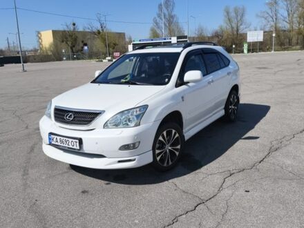 Белый Лексус РХ, объемом двигателя 3.5 л и пробегом 252 тыс. км за 12500 $, фото 1 на Automoto.ua