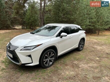 Білий Лексус РХ, об'ємом двигуна 2 л та пробігом 150 тис. км за 35500 $, фото 1 на Automoto.ua
