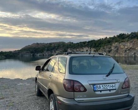 Бежевий Лексус РХ, об'ємом двигуна 3 л та пробігом 300 тис. км за 4995 $, фото 1 на Automoto.ua