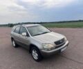 Бежевий Лексус РХ, об'ємом двигуна 3 л та пробігом 300 тис. км за 4995 $, фото 1 на Automoto.ua