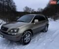 Бежевый Лексус РХ, объемом двигателя 3 л и пробегом 280 тыс. км за 4999 $, фото 1 на Automoto.ua