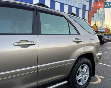 Бежевий Лексус РХ, об'ємом двигуна 3 л та пробігом 327 тис. км за 5700 $, фото 1 на Automoto.ua