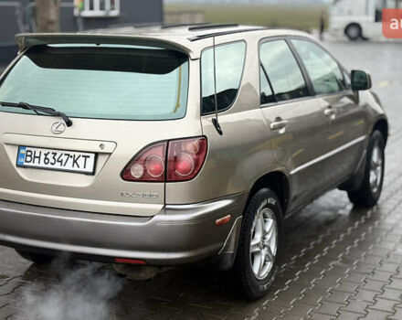 Бежевый Лексус РХ, объемом двигателя 3 л и пробегом 199 тыс. км за 6150 $, фото 18 на Automoto.ua